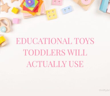 Pink flat lay of educational toys for toddlers. Christmas and birthday gift ideas including wooden toys, magnetic tiles, stacking stones, balance bike, and Montessori toys.